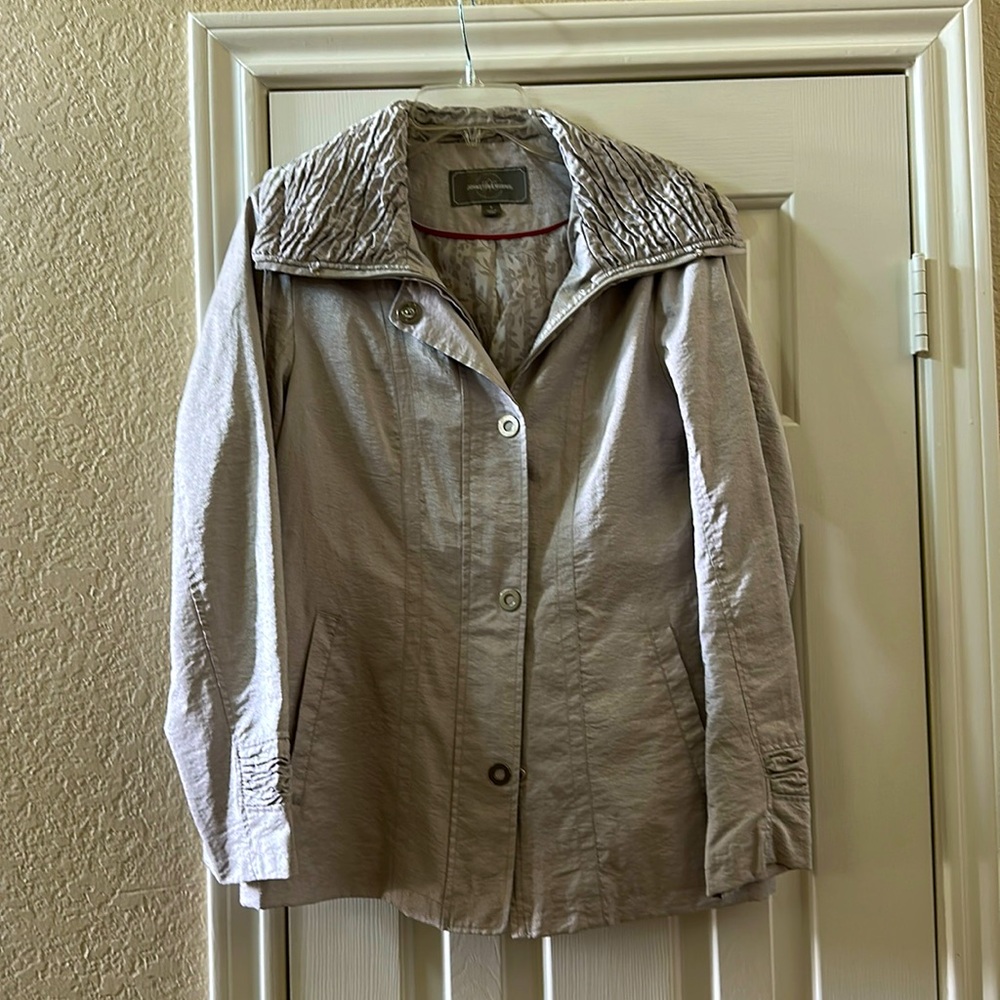 Johnston & Murphy Small, light grey rain jacket.